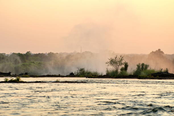 Sunset over the Zambezi River, above Victoria Falls, in Livingstone, Zambia