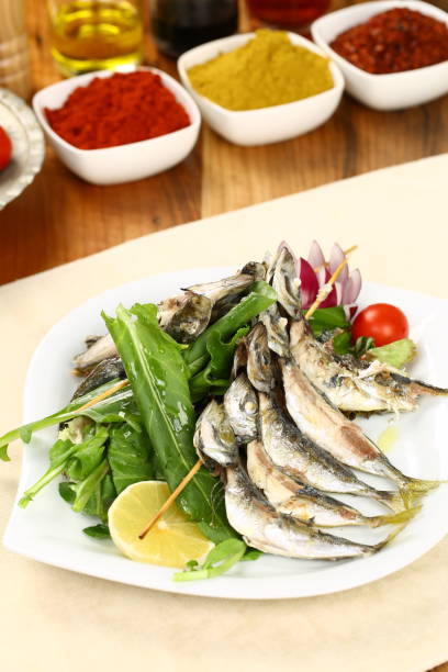 istock Horse mackerel fish grilled with skewers 954364934