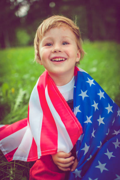 istock Little boy celebrating Fourth of July 954368672