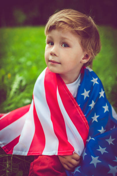 istock Little boy celebrating Fourth of July 954368698