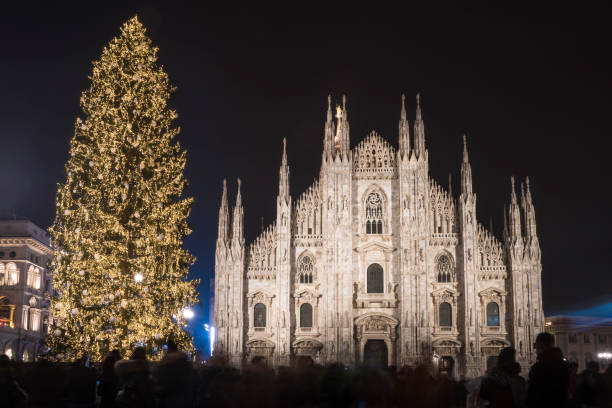 istock Christmas tree in front of Milan cathedral 954371102