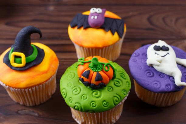 istock Delicious homemade cupcakes with funny Halloween decorations mad 954381040