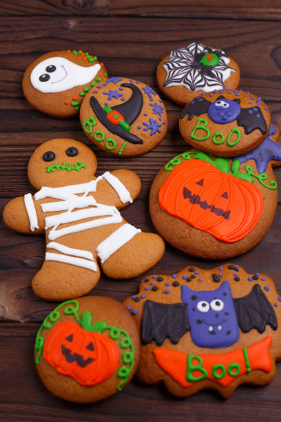 istock Delicious homemade Halloween ginger cookies with ghosts, pumpkin 954384402