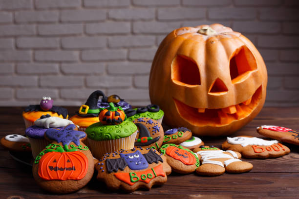 istock Delicious Halloween treat for dessert,cupcakes and ginger cookie 954384682
