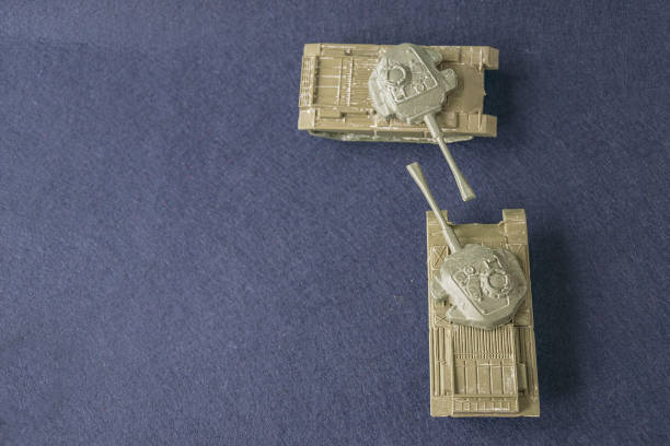 Small toy model of plastic green tanks