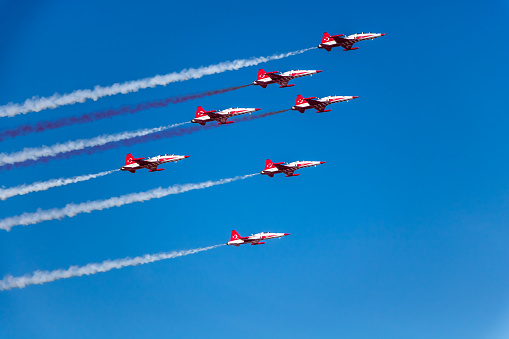 7 aerobatics plane in triangle formation