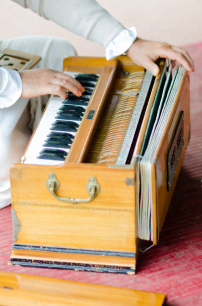istock musical entertainments with harmonium during Guru Purnima 954407398