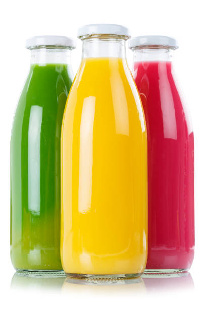 istock Smoothie juice orange smoothies in bottle portrait format isolated 954409078