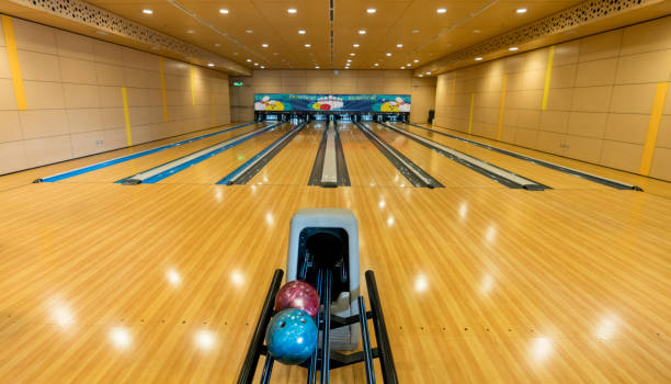 Empty bowling alleys Empty bowling alleys - No people bowling alley stock pictures, royalty-free photos & images