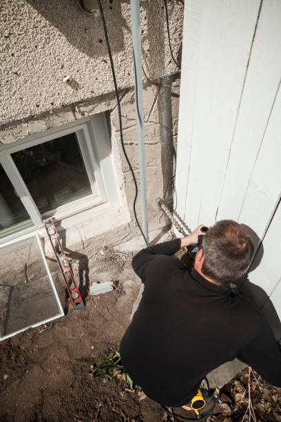istock Solar Panel Installation - Running Wiring to Home 954419666
