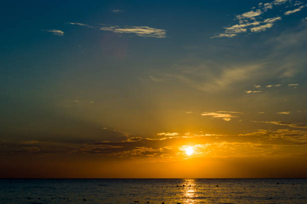 istock Amazing sea sunset, the sun, waves, clouds 954424212