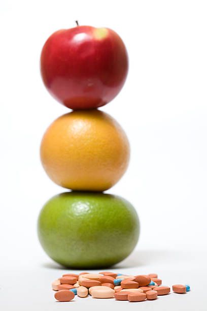 istock healthy fruits and pills 95442767