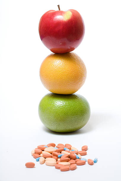 istock healthy fruits and pills 95442771