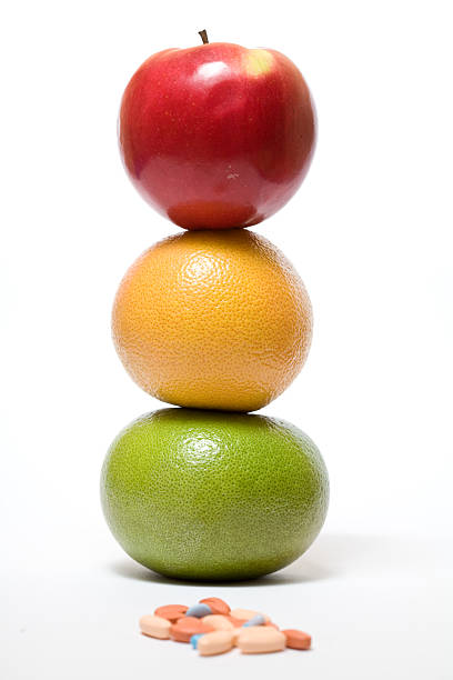 istock healthy fruits and pills 95442778