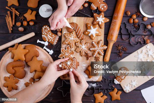 Christmas Gingerbread Making Friends Decorating Freshly Baked C Stock Photo - Download Image Now