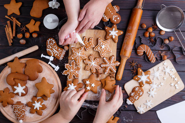 istock Christmas gingerbread. Top view on table with baking utensils an 954428636