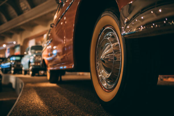istock A retro 1950s salmon color car front left wheel 954434092