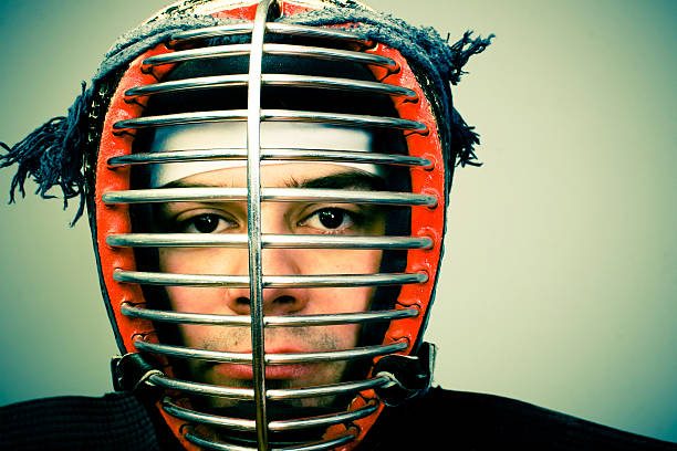 istock Man in kendo armor portrait 95443714