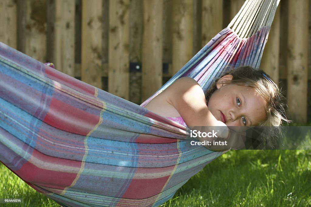 Little girl sleeping in hammock  Adults Only Stock Photo