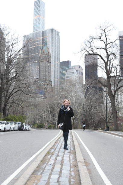 istock Woman in Central Park, Manhattan, NYC 954441750