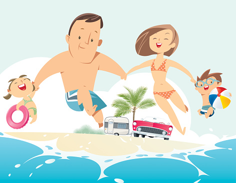 Happy family jumping on a sandy beach.