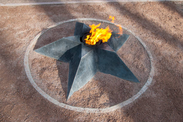 istock Memorial Eternal Flame. War Victory Fire. Glory Metal Star with a fire. Russia. 954451718
