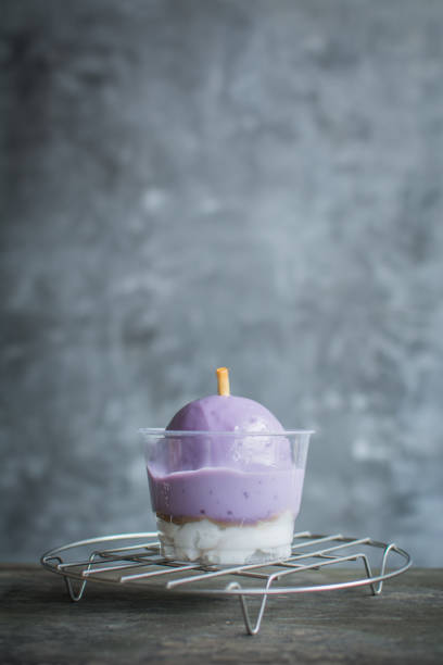 istock Delicious cupcake on wooden and loft background 954478452