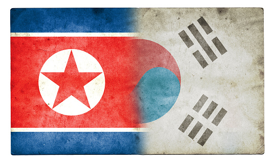 A stock photo of the North Korea and South Korea flags blended together,.