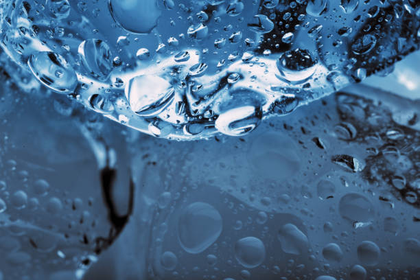istock Cube of ice with drops shot close-up 954491310