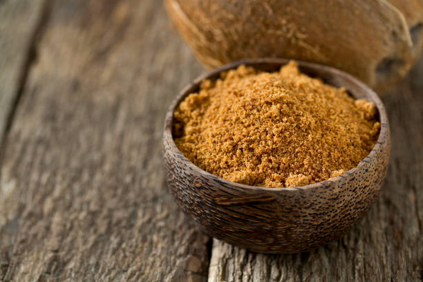 istock coconut palm sugar on wooden surface 954491846