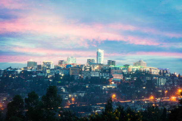 Kigali skyline, Rwanda View of Kigali business district with offices, towers and residential homes, at sunset rwanda stock pictures, royalty-free photos & images