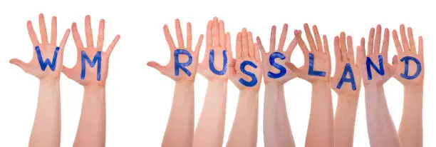 Many People Hands With Letters Building The German Word WM Russland Means Russia 2018. Isolated White Background