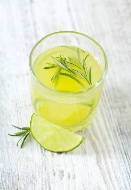 istock lime lemonade on wooden background 954494970