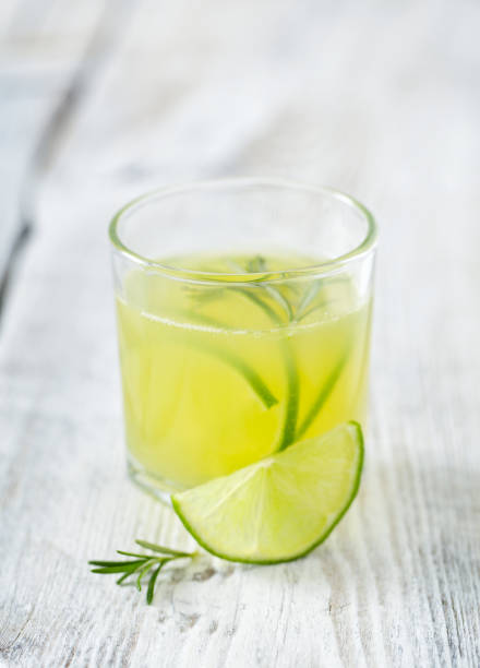 istock lime lemonade on wooden background 954495044