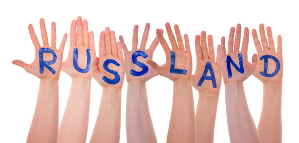 istock Hands With Russland Means Russia, Isolated 954496308