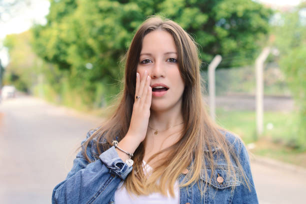 istock Young woman with surprised expression. Outdoor. 954496716
