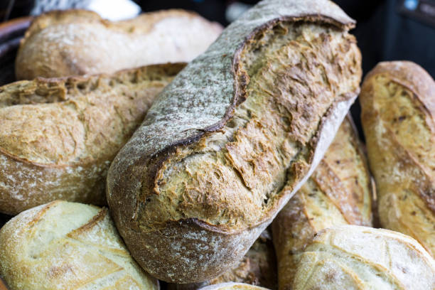 istock Fresh bread on table close-up. Fresh bread on the kitchen table The healthy eating and traditional bakery 954497142