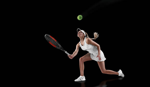 istock tennis isolated on black 954514112