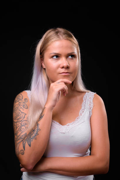 istock Beautiful Blonde Woman Thinking 954515510