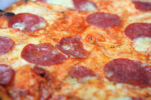 istock Fresh italian Pizza with Salami, Tomato and Cheese 954523026