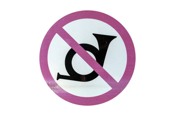 Don't honk, no sound road sign isolated on white.