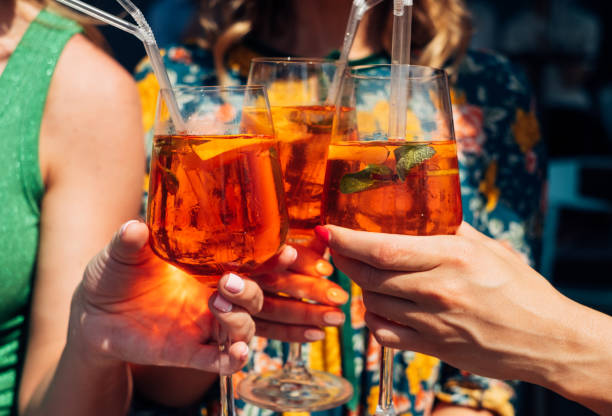 Toasting glasses with fresh iced cocktails