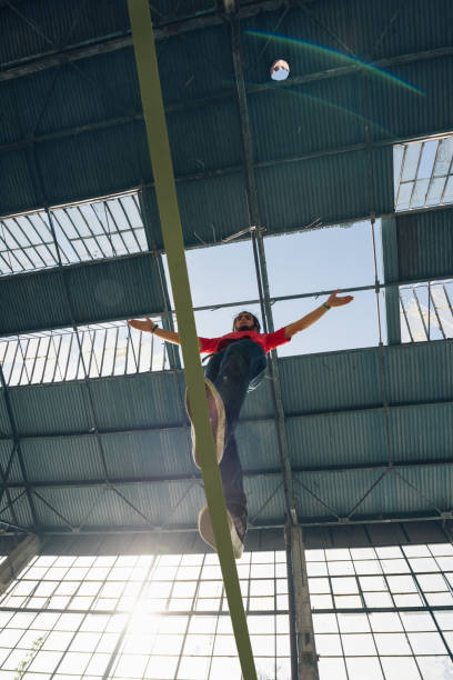 istock Man balancing on the slackline 954532556