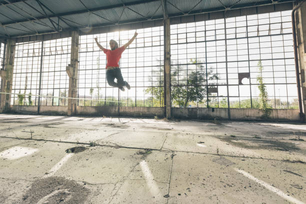 istock Man jumping on the slackline 954533154