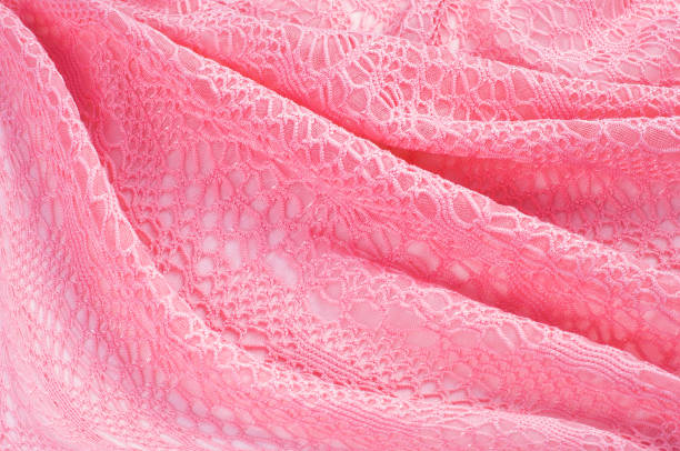 istock The texture of the silk fabric, soft pink 954533302