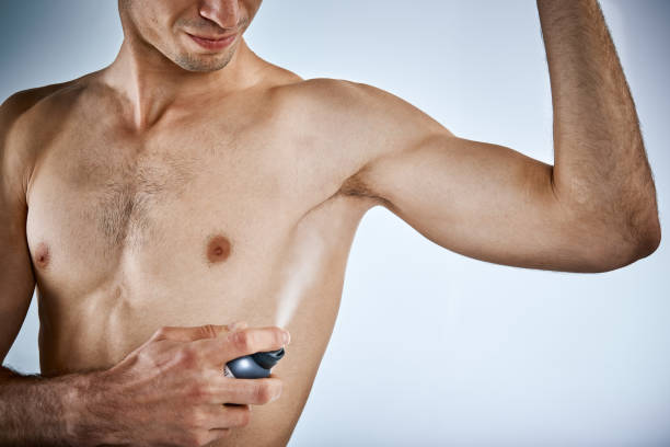 筋肉青年消臭スプレー脇の下 - chest sweat male pectoral muscle ストックフォトと画像