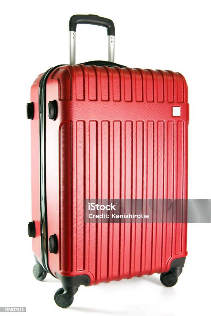 Red travel luggage isolated on white background Red color travel suitcase isolated on white background. Suitcase Stock Photo