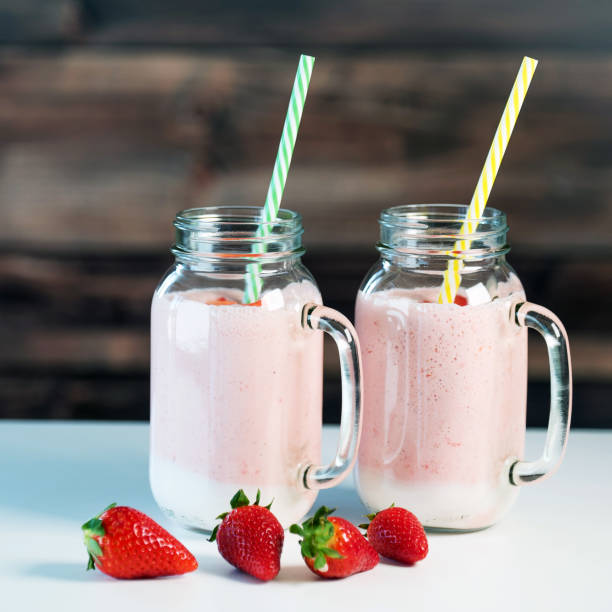 istock Strawberry milkshake in the glass jar 954537860