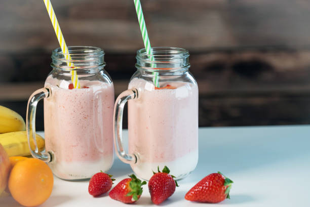 istock Strawberry milkshake in the glass jar 954537948