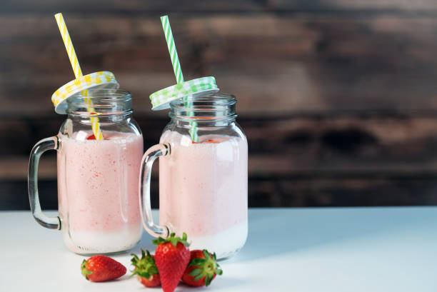 istock Strawberry milkshake in the glass jar 954538000
